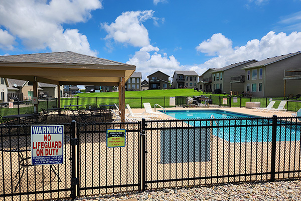 View of the free pool across the street from Okoboji Oasis vacation rental